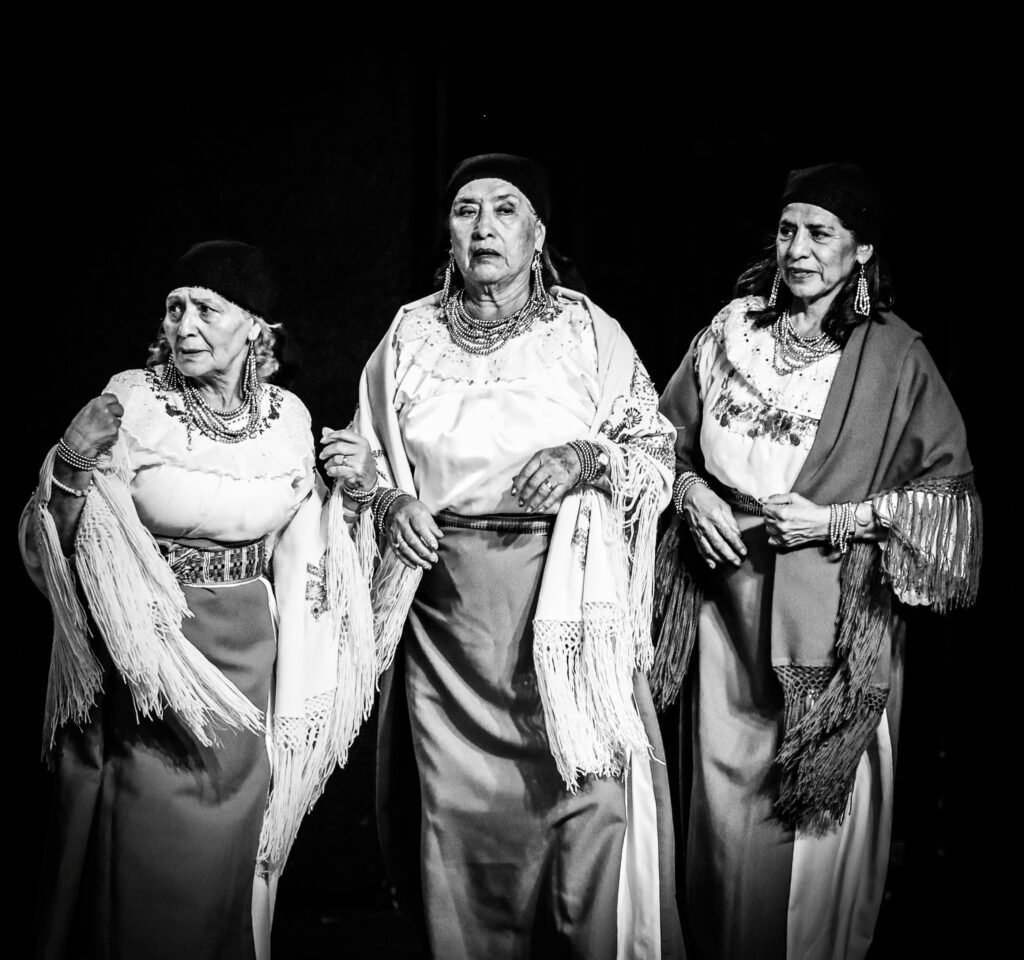Older women standing together before traditional performance