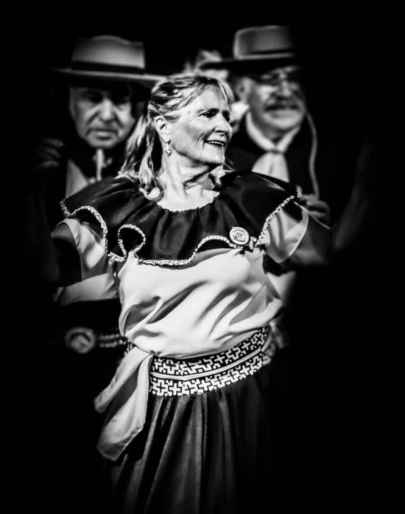 Performer dancing during theatrical folk performance