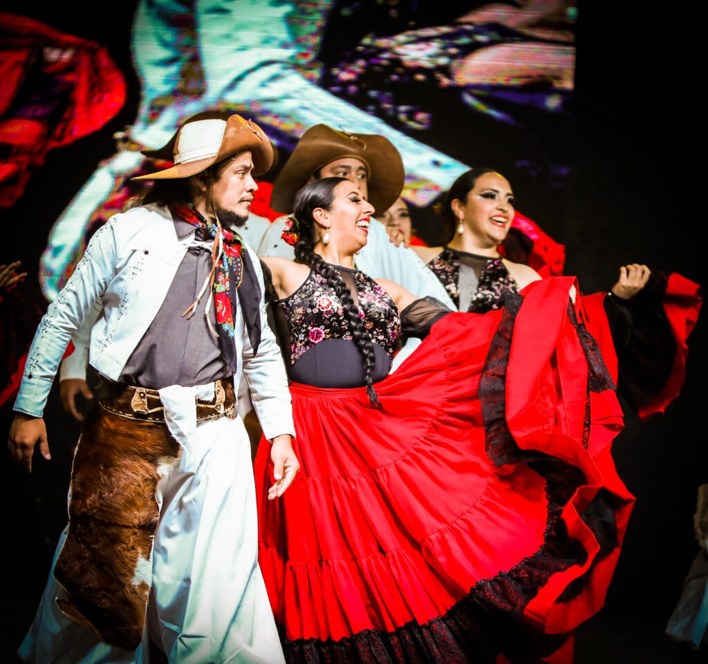 Intergenerational dancers during traditional folk performance